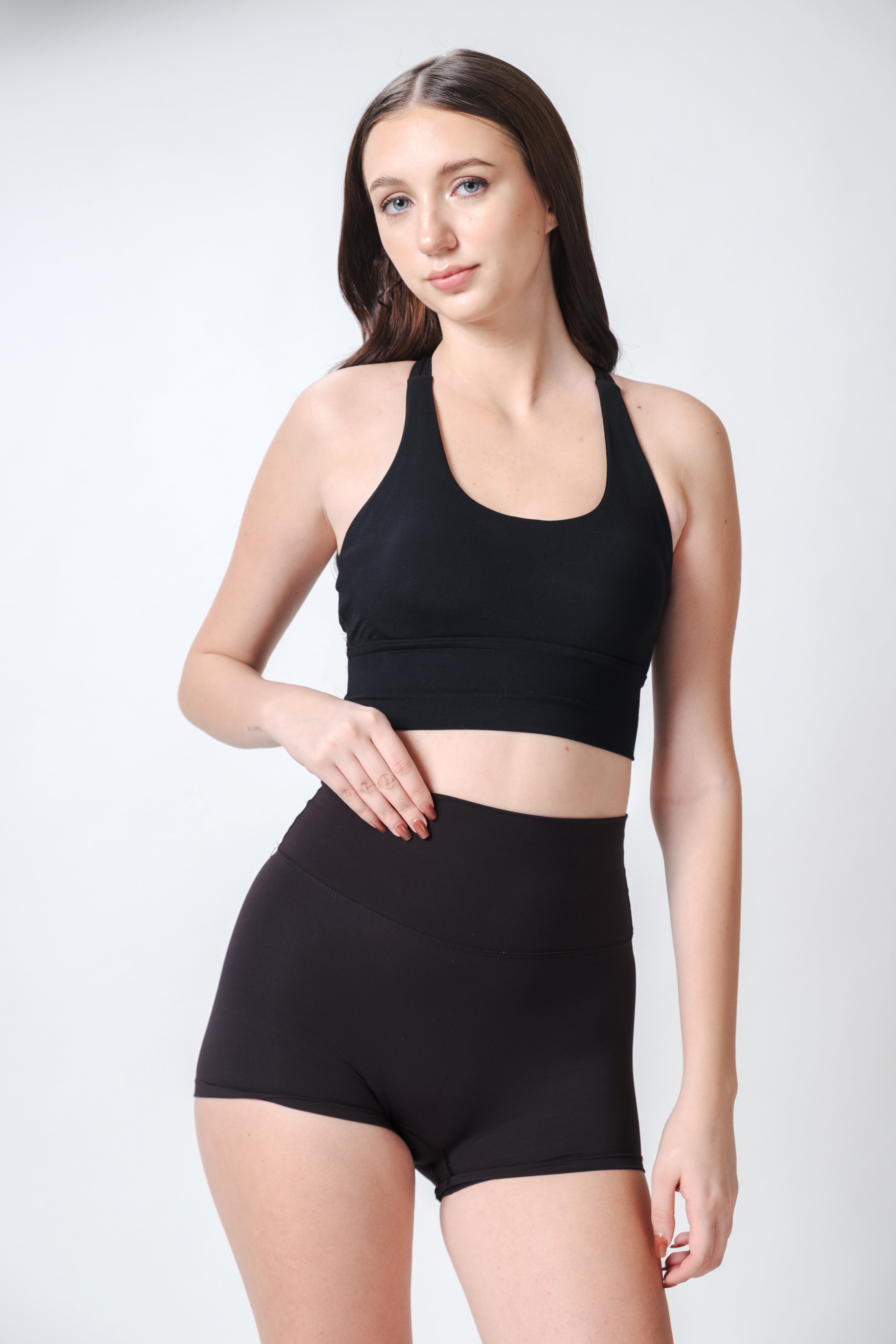 Flow State Criss Cross Sport Bra Inkline Black Viktoria is 5'9 wearing S