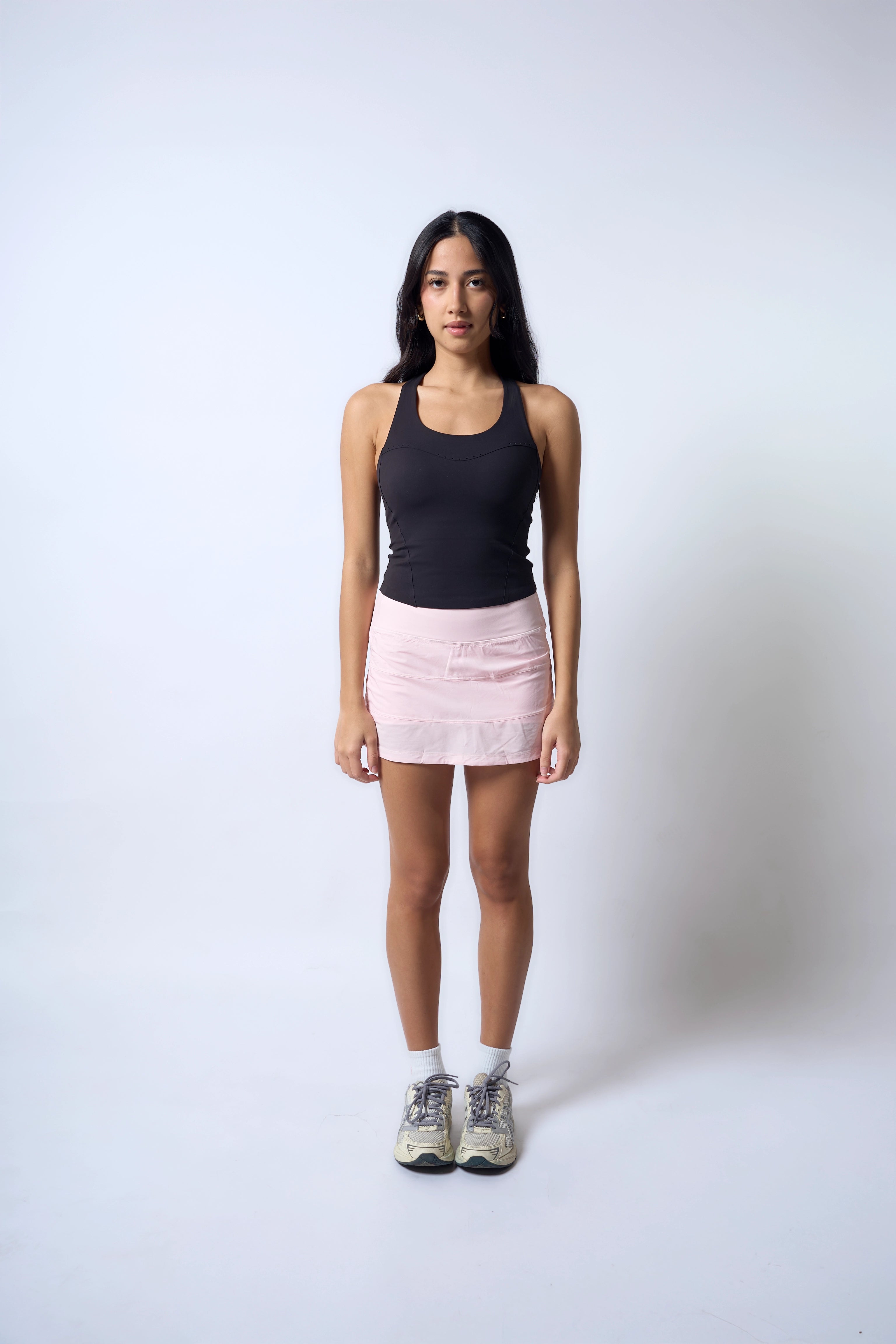 Aligned Skirt Baby Pink Julia is 5'5 wearing M