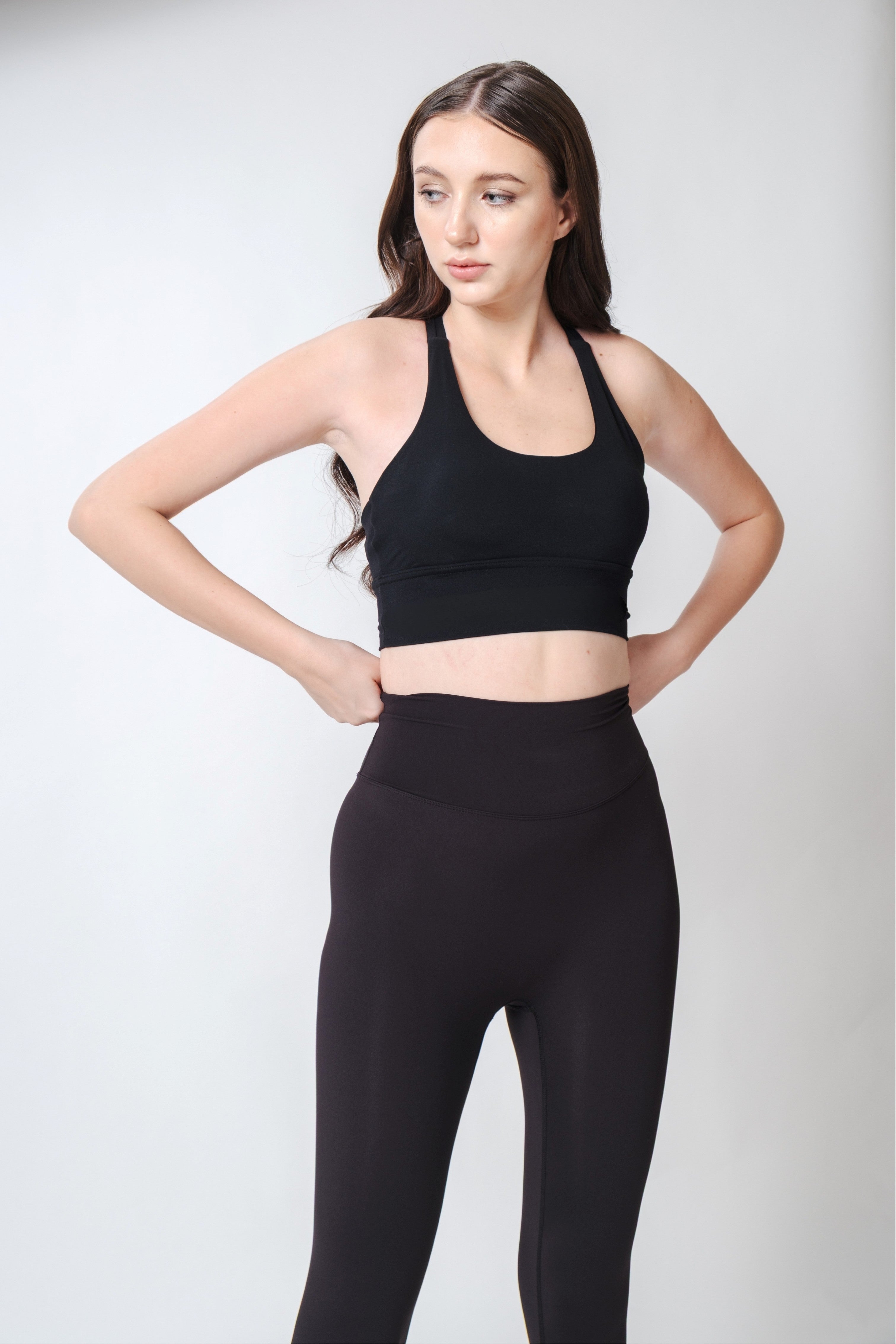Flow State Criss Cross Sport Bra Inkline Black Viktoria is 5'9 wearing S