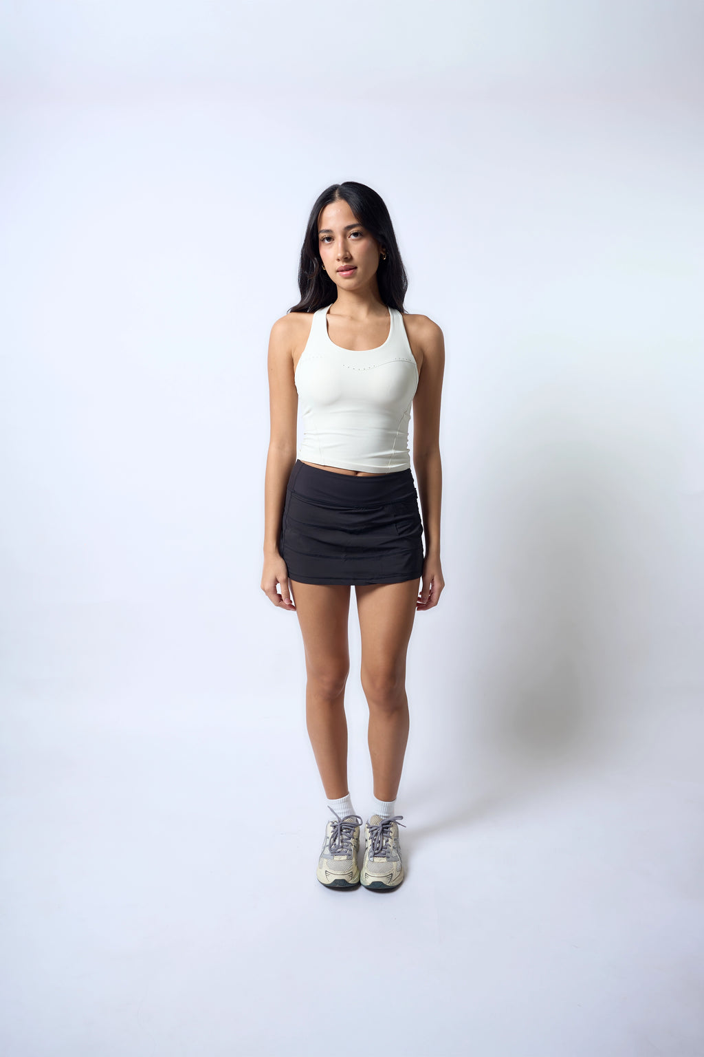 Aligned Skirt Inkline Black Julia is 5'5 wearing M