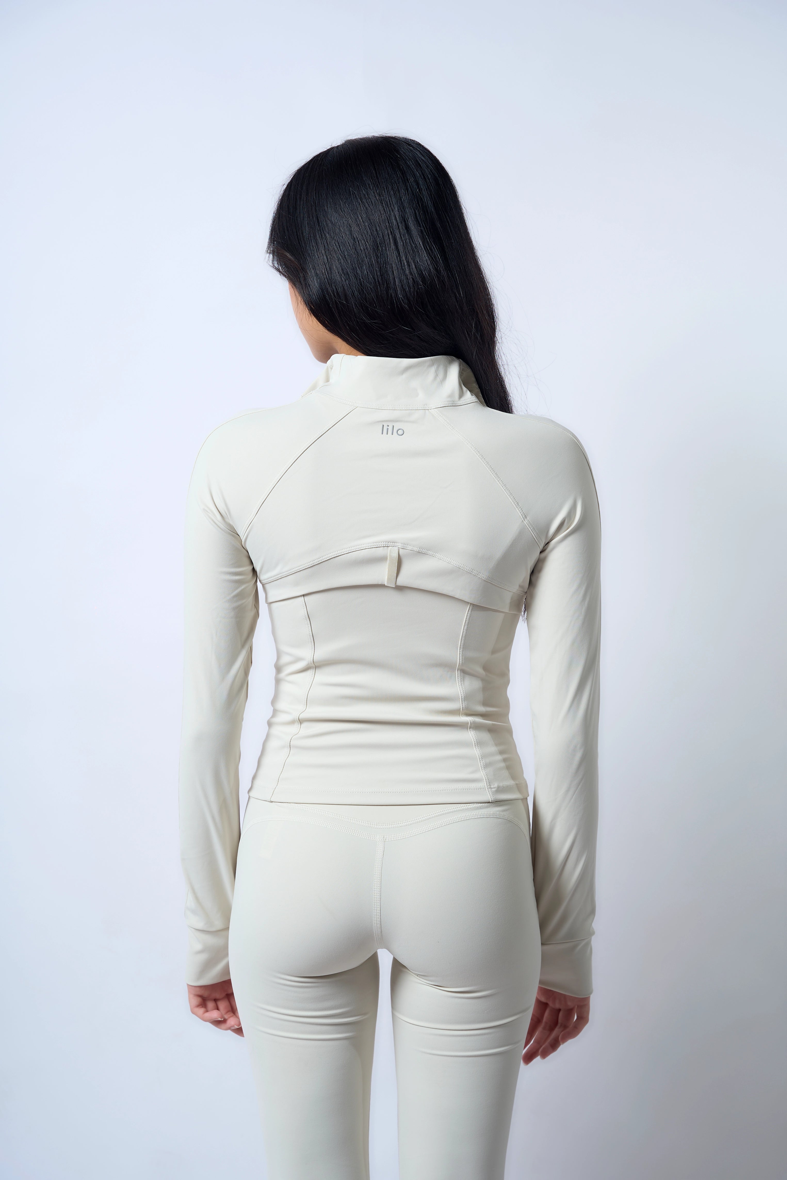 Aligned Jacket Bone White Julia is 5'5 wearing S