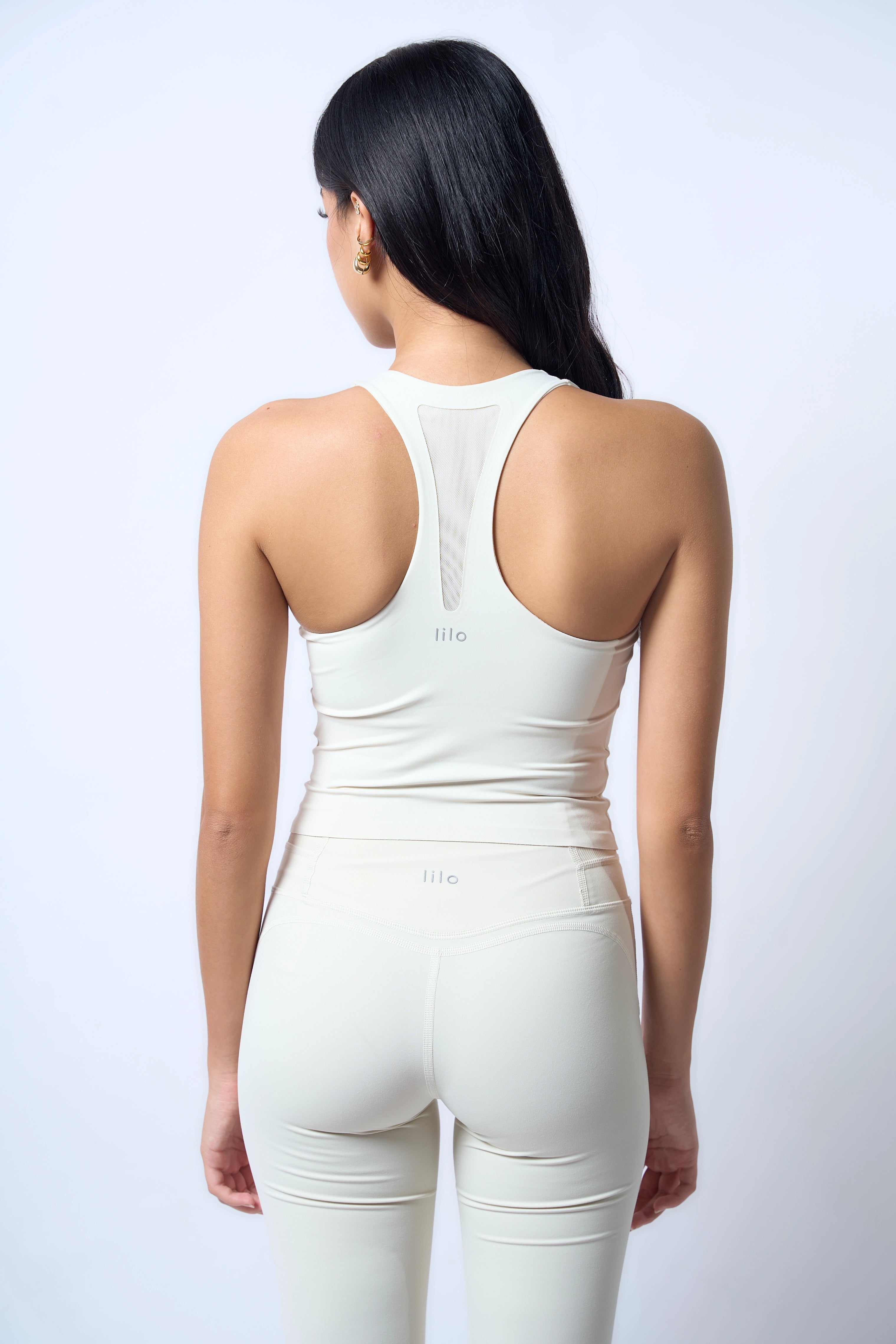 Aligned Top Bone White Julia is 5'5 wearing S