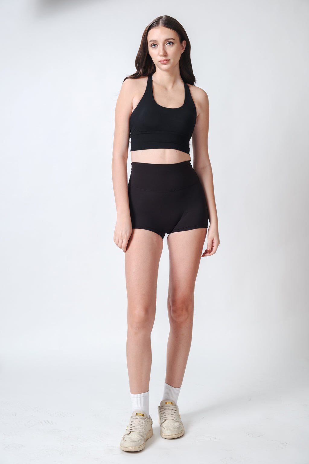 Flow State Criss Cross Sport Bra Inkline Black Viktoria is 5'9 wearing S